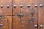 Albaicin, Province of Granada, Andalusia, Spain. Peep hole on an old wooden door. Art Print